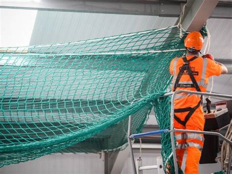 safety nets must be drop-tested at the jobsite with a|fall safety net installation requirements.